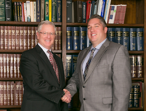 Attorneys Douglas A. Tull and Andre Laubach
